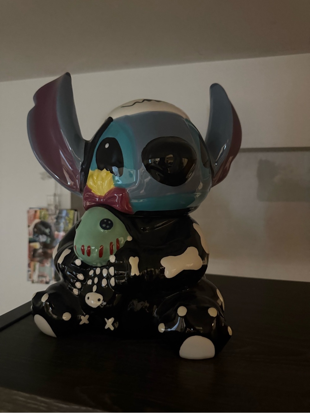Whimsical Halloween Stitch Ceramic Figurine with doll.